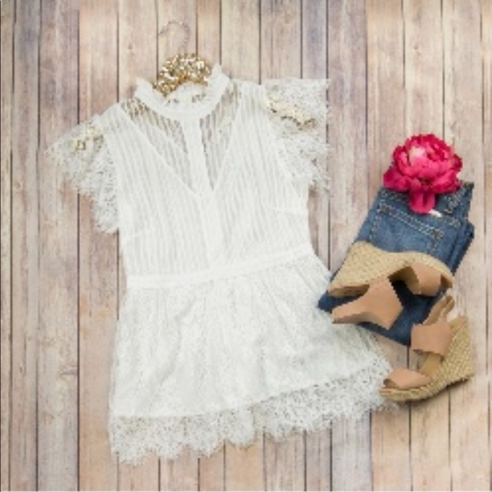White lace peplum top. Size S
